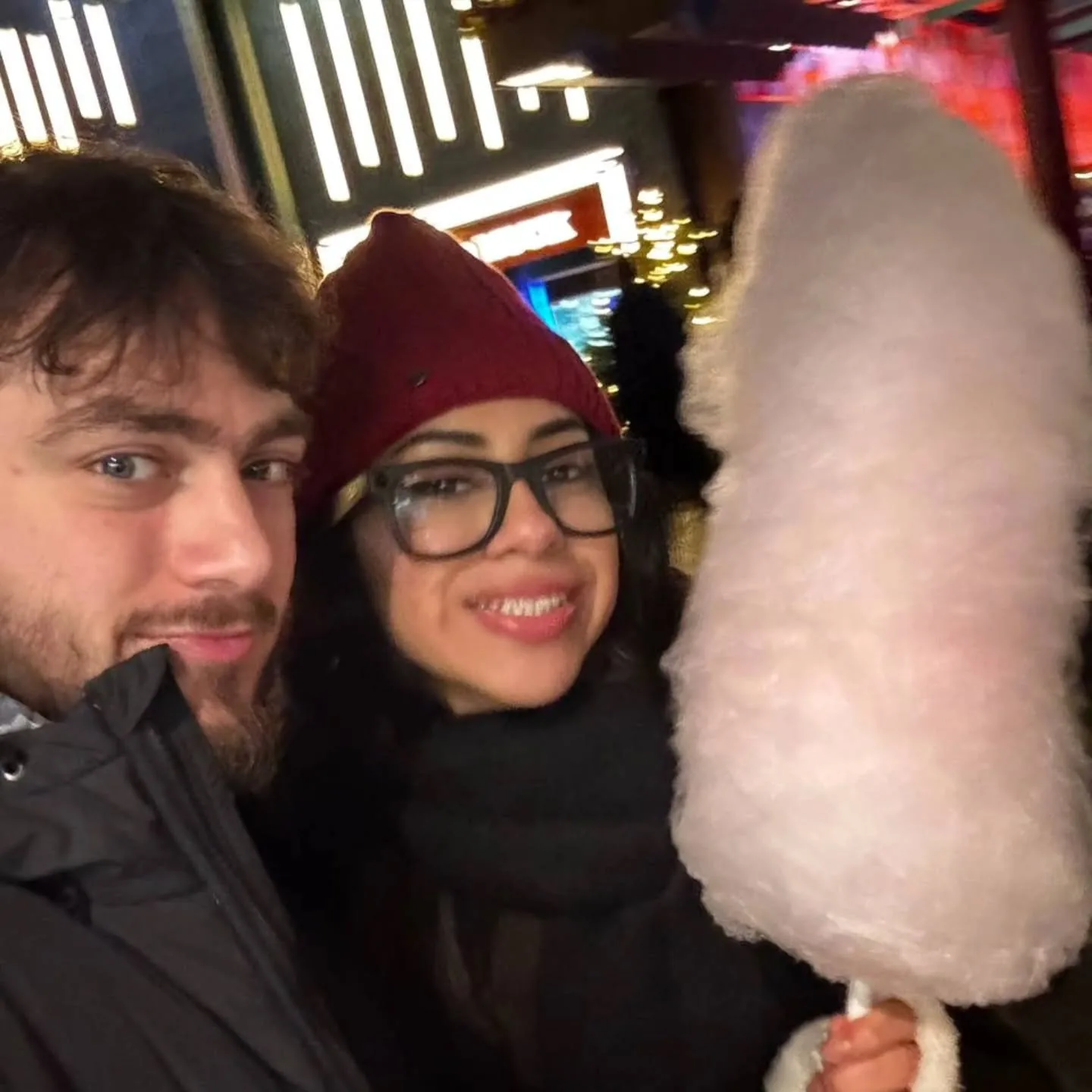 Cristal and me sharing cotton candy at a night market