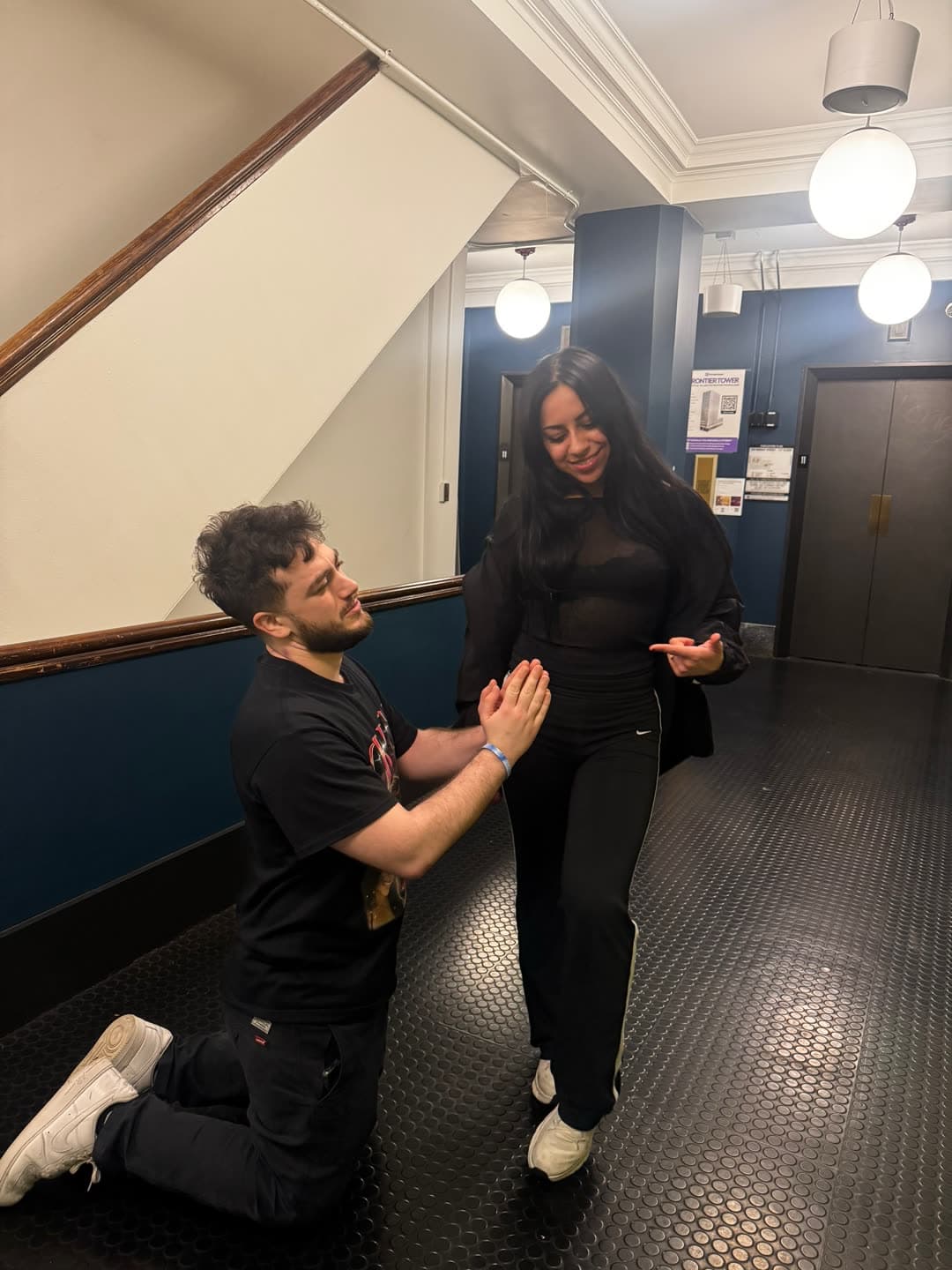 Me kneeling for Cristal in the Montier Tower hallway