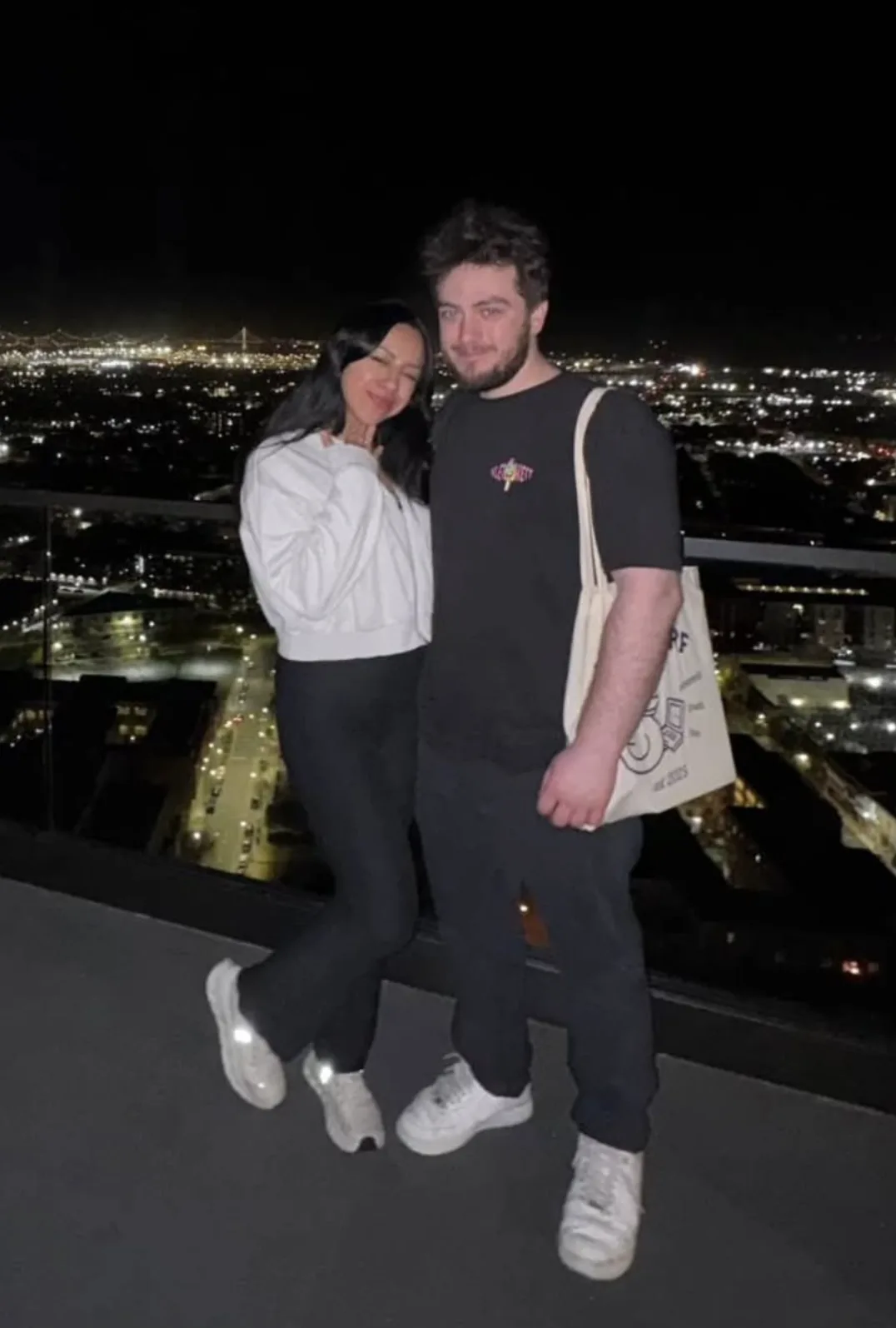 Cristal and me on a San Francisco rooftop at night